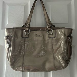 Coach Metallic medium size bag. Not used a few times. Clean, no smoking